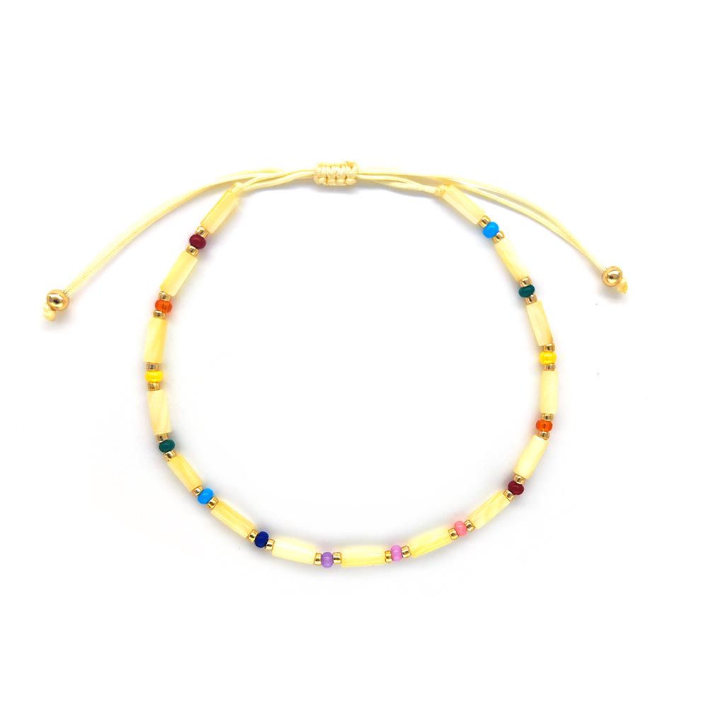 

Original Natural Shell Cylinder Bead Bracelet: Fine Woven Lucky Hand Rope for Women