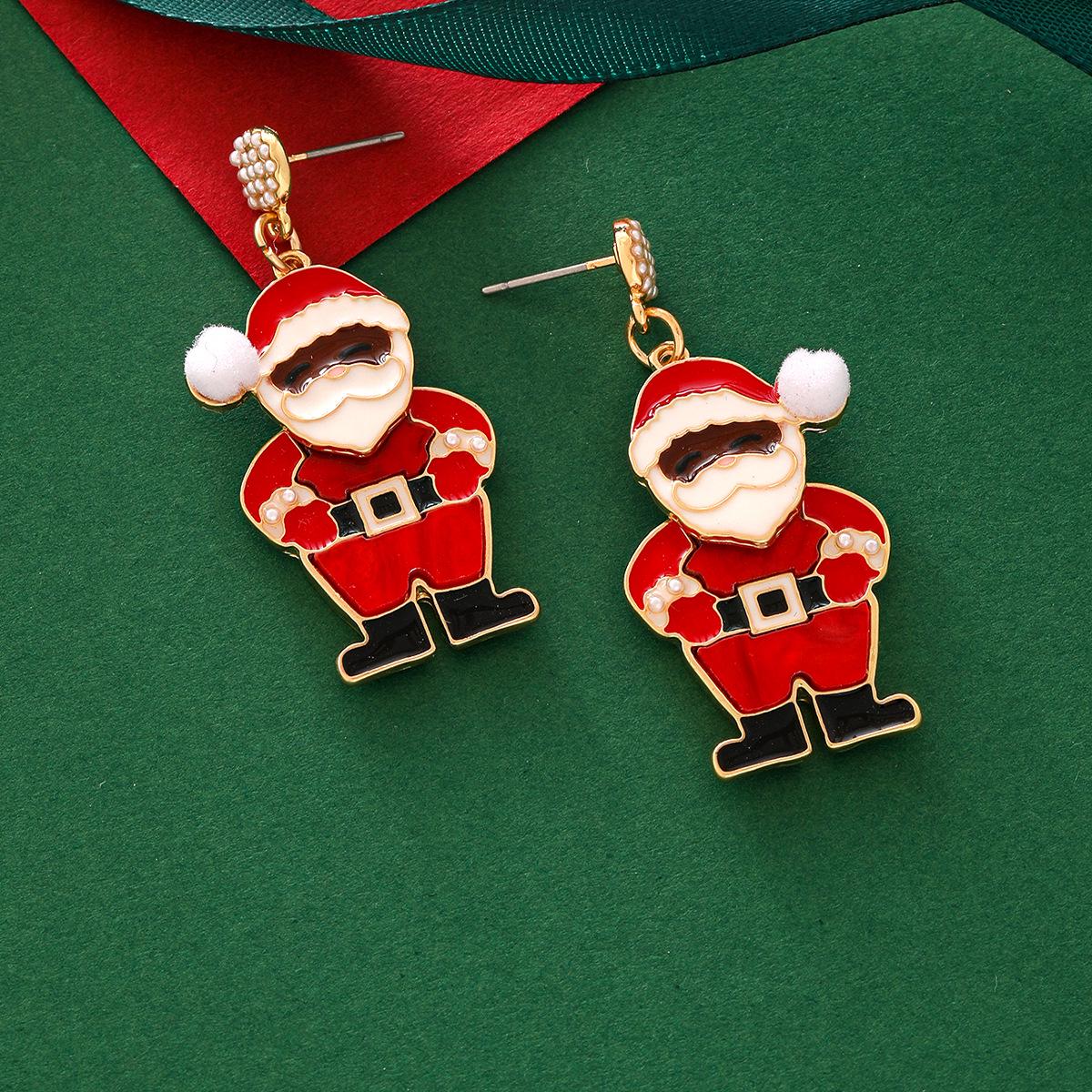 

Высококачественные серьги из сплава с изображением Санта-Клауса в европейском и американском мультяшном стиле — праздничные и веселые.
