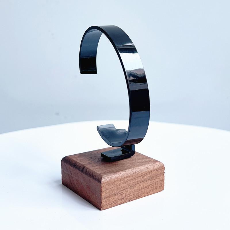 Kratzfester Holz-C-förmiger Uhrenhalter 1 Stück Schmuck-Ausstellungsständer für Armbandgeschäft Vitrinenverwendung