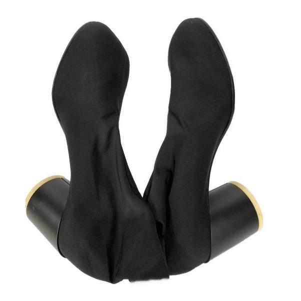 Used thigh-high boots