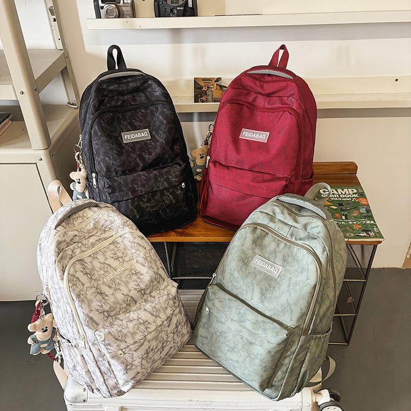 Japanese and Korean leisure large-capacity labeling student schoolbag graffiti junior high school student backpack