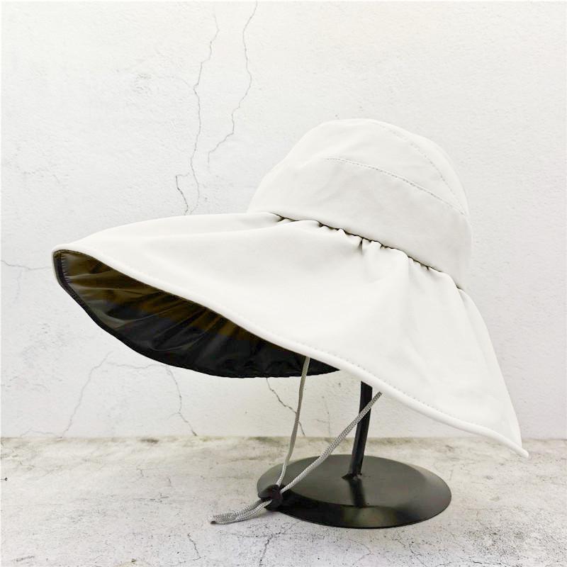 Women's Black Vinyl Bucket Hat with UV Face Shield, Adjustable & Foldable Summer Sun Protection Hat.
