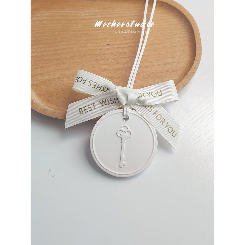 Car Perfume Pendant Aromatherapy Car Interior Ornaments Key Car Light Perfume Fragrant Stone Wardrobe Gifts for Men and Women