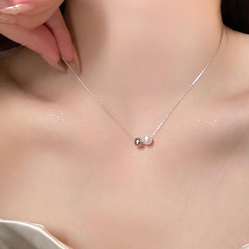 

Женское элитное титановое стальное колье-чокер с цепочкой «костяная змея» и жемчужинами-бобами