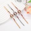 Elegant Petite Ladies' Wristwatch with Inlaid Gemstones