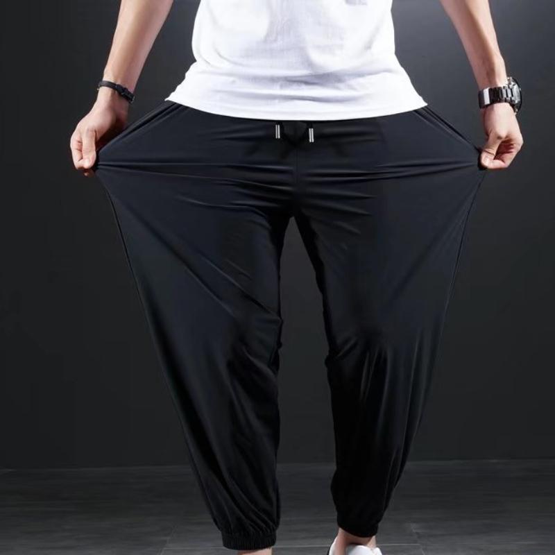 

Летние быстросохнущие повседневные брюки из ледяного шелка, мужские ультратонкие эластичные брюки с девятью точками, свободные драпированные однотонные брюки с лучами 8XL чёрный