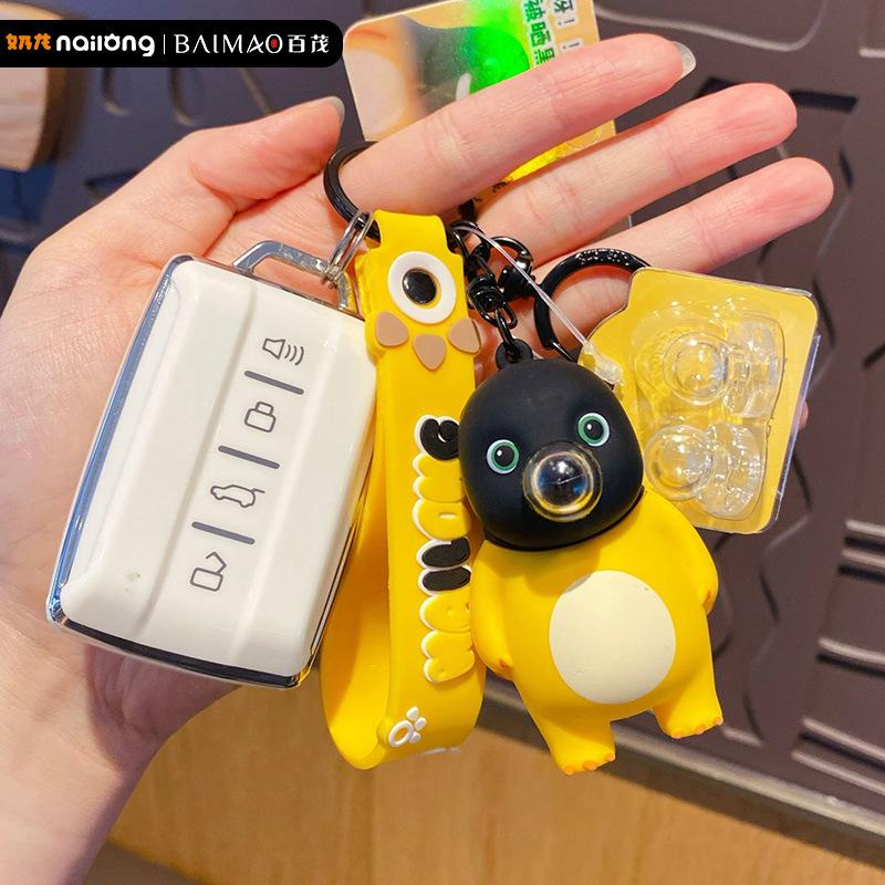 Dekompressions-Blasenblasen lustiges schwarzes Gesicht Milch Drache Schlüsselanhänger Anhänger niedliche zarte Dekompressionspuppe Entlüftungsspielzeug