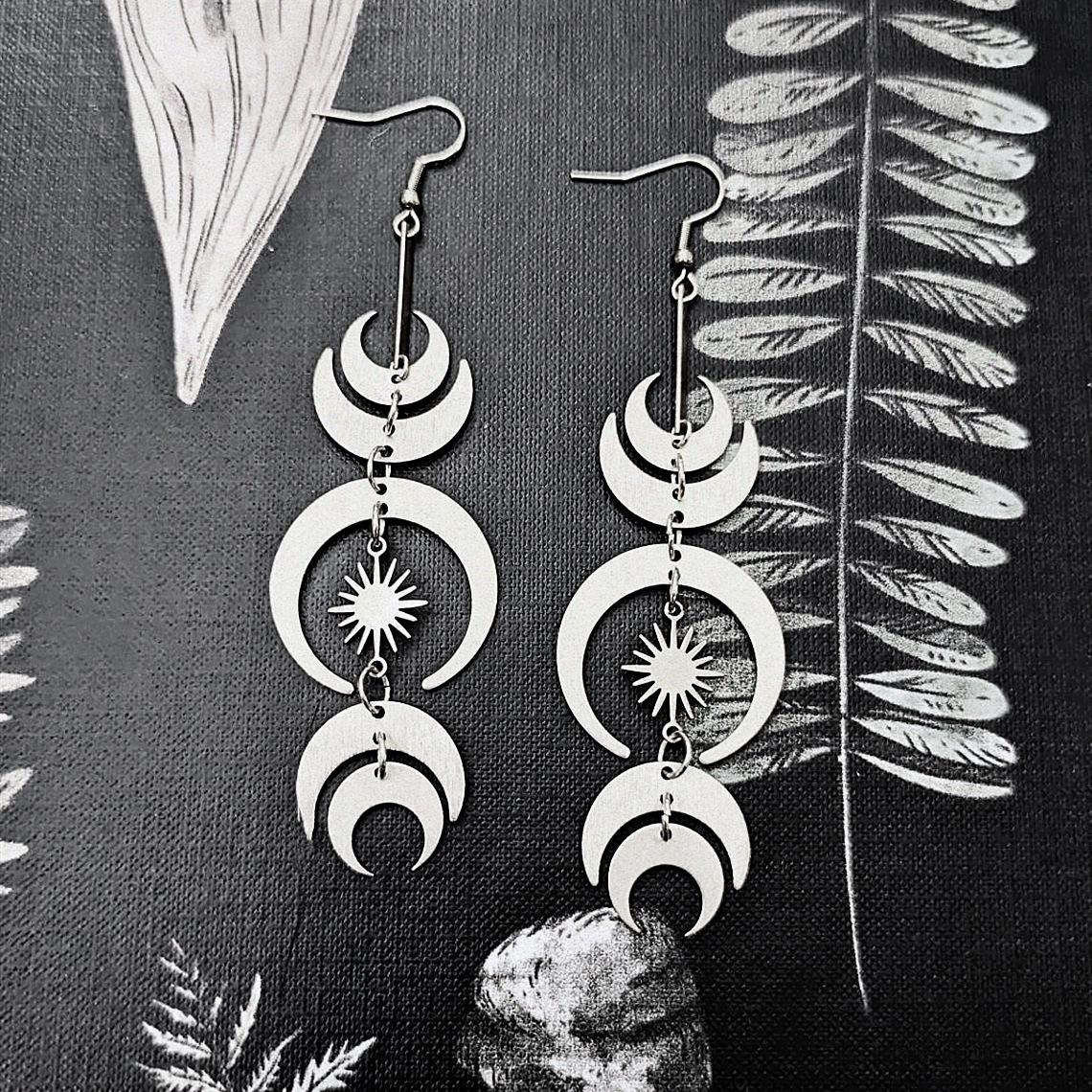 

Moon Phase Declaration Earrings: Solar Eclipse Design