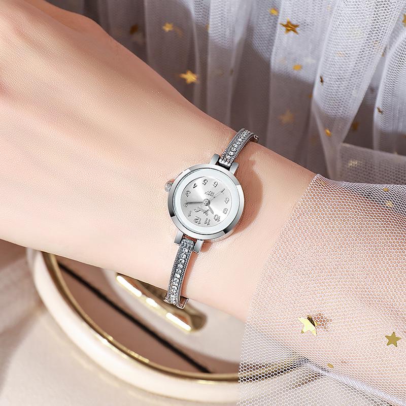 Women's high appearance level vivid exquisite Arabic numerals dial small dial steel band quartz watch.