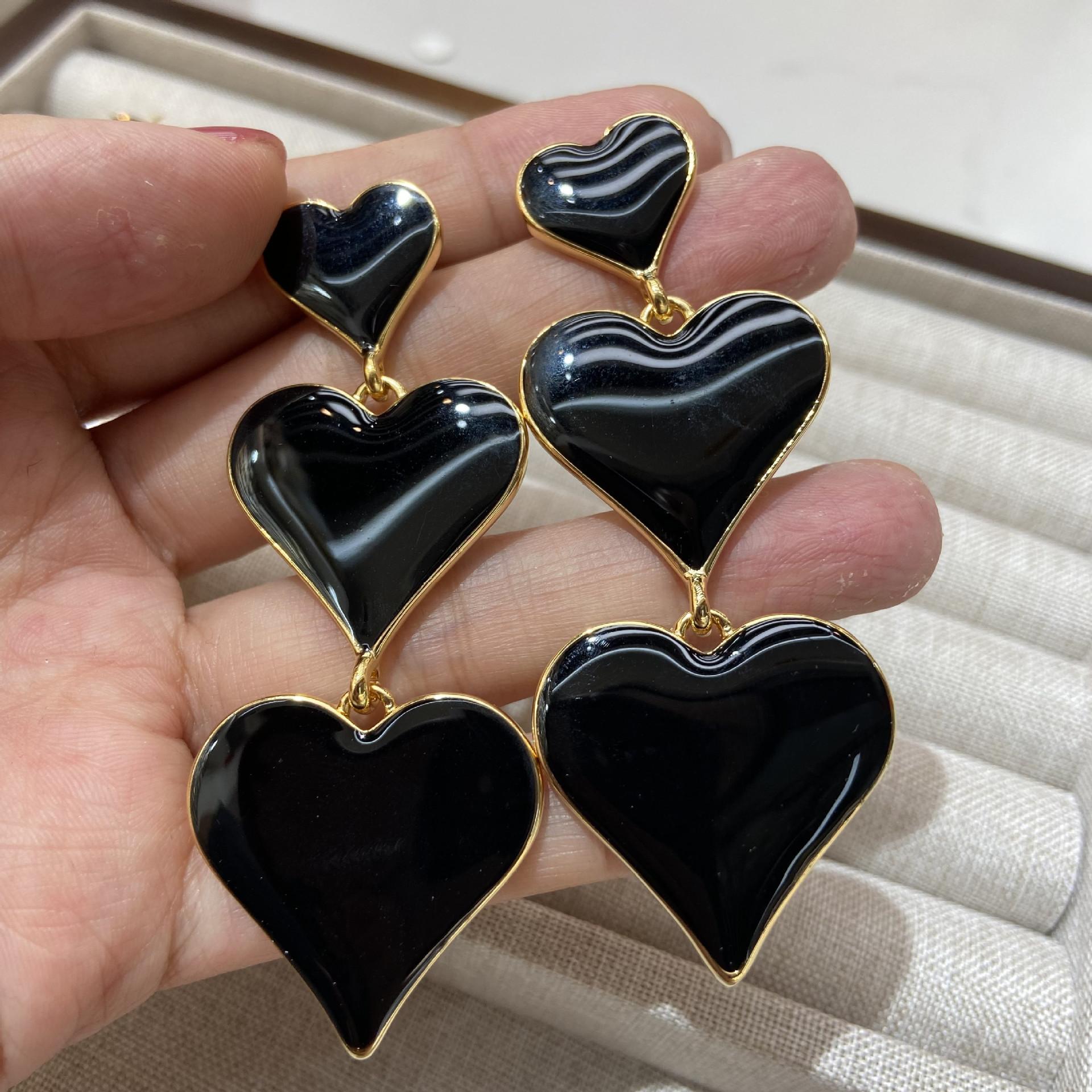 

Modern Muse Painted Oil Black Peach Heart Long Earrings Women S Dripping Oil Love Earrings Needles