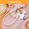 Chic Pearl And Rhinestone Keychain Featuring Charming Butterfly Bow Perfect For Collectors