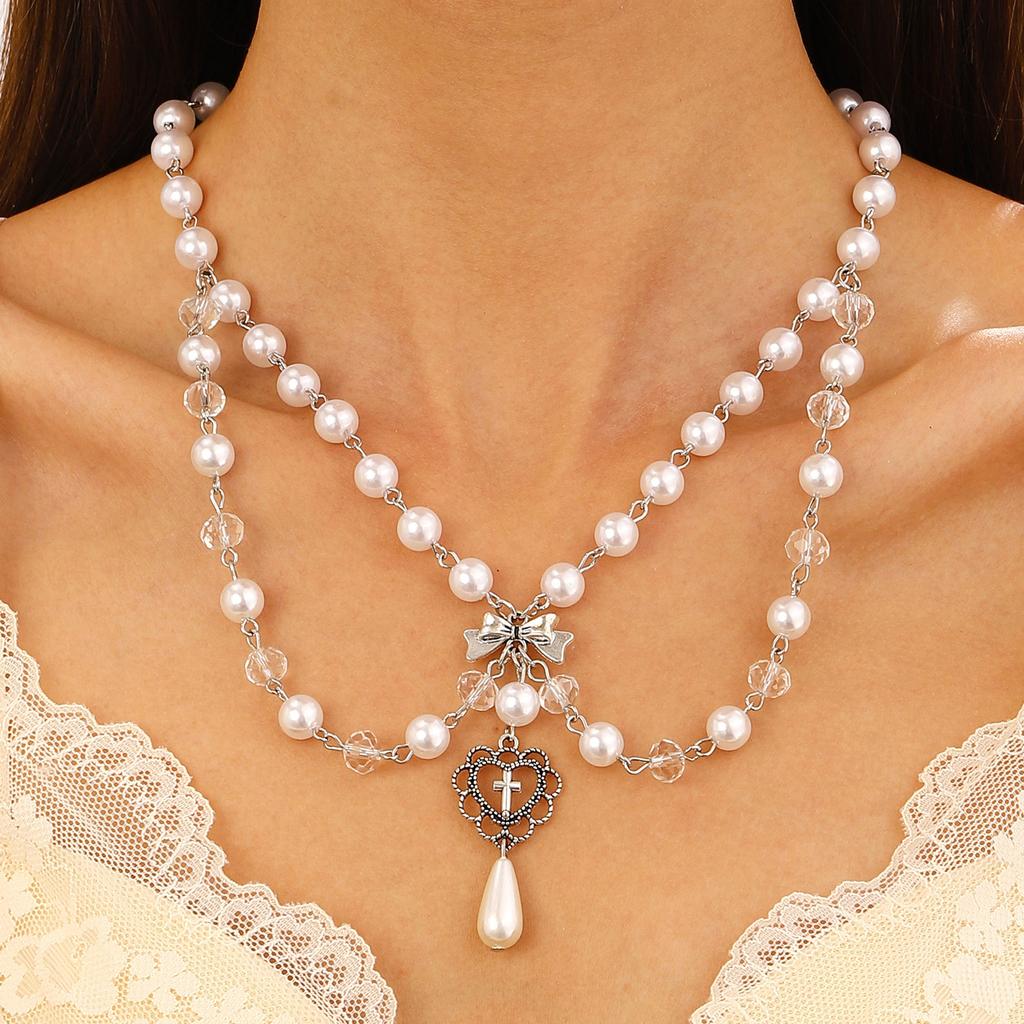 Spezialinteresse Design Heißes Mädchen Imitation Perle Quaste Liebe Kreuz Schmetterling All-Match Halskette
