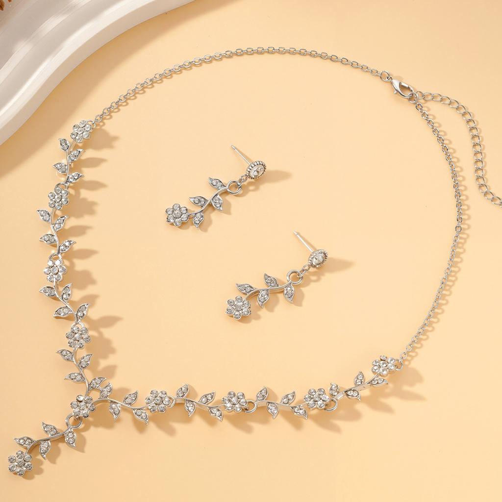 Popular Leaf and Flower Rhinestone Two-Piece Set Elegant dress paired with diamond-studded necklace and earrings for women