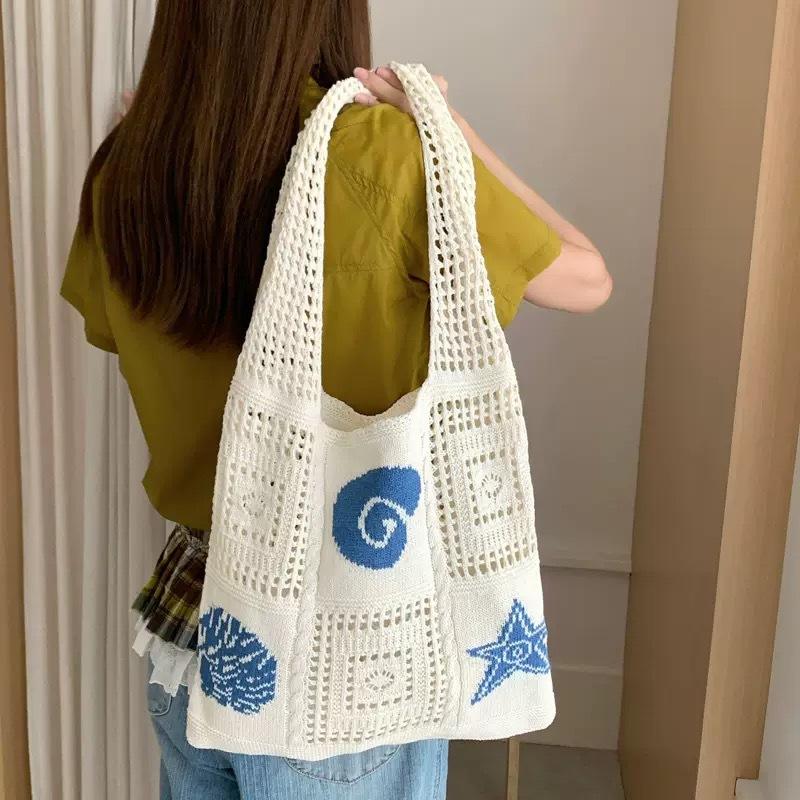 Summer super fire woven bag women's new literary and artistic style wool knitted vacation beach bag shoulder messenger bag