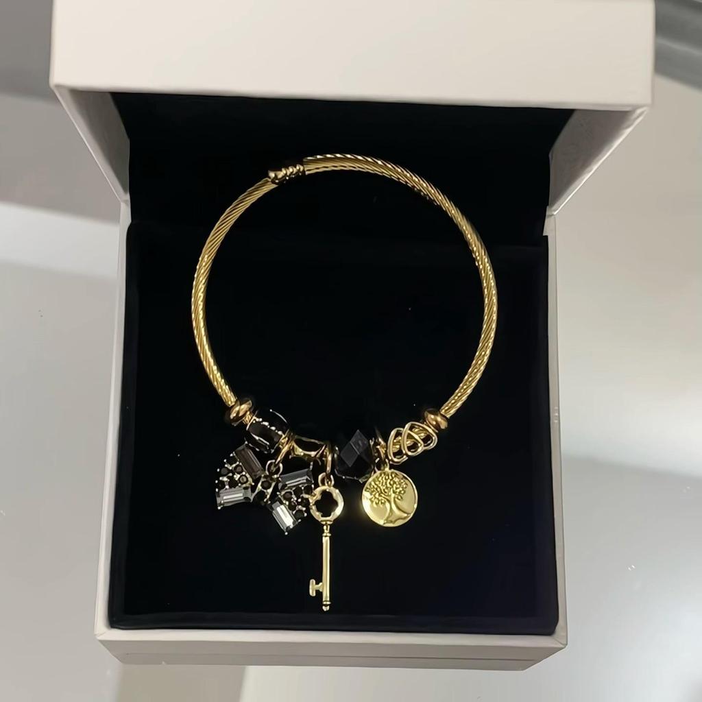 Panjia Fashion Gold Stainless Steel Bowknot Bracelet with Crystal Beads and Rhinestone Pendant.