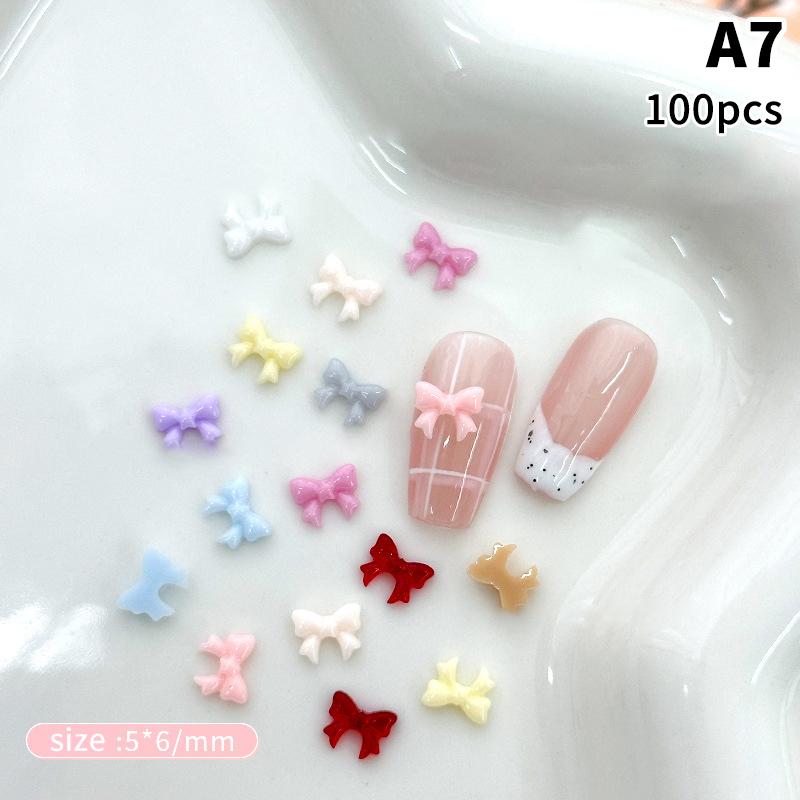 100Pcs 3D Mini Bow Resin Nail Art Decoration Bowknot Ornament Nail Charm Jewelry Design Kawaii Gem
