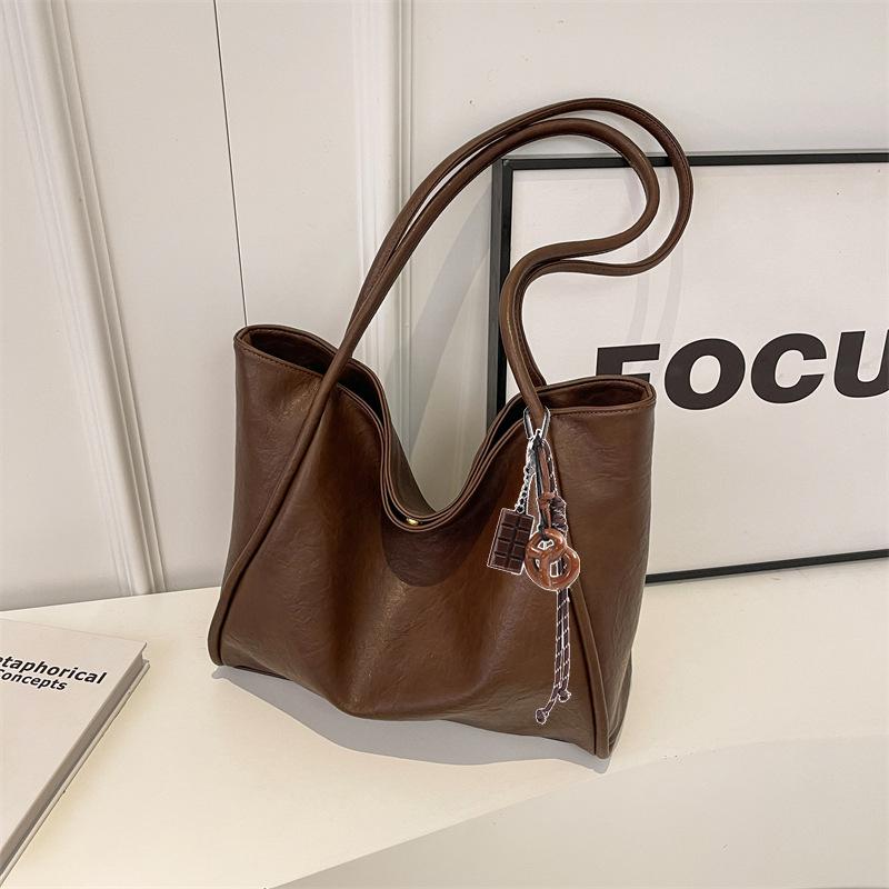 

Индивидуализированная оригинальная осенне-зимняя сумка-тоут большого объема с высоким чувством класса, женская новая большая сумка 2025 года, сумка-тоут через плечо для通勤