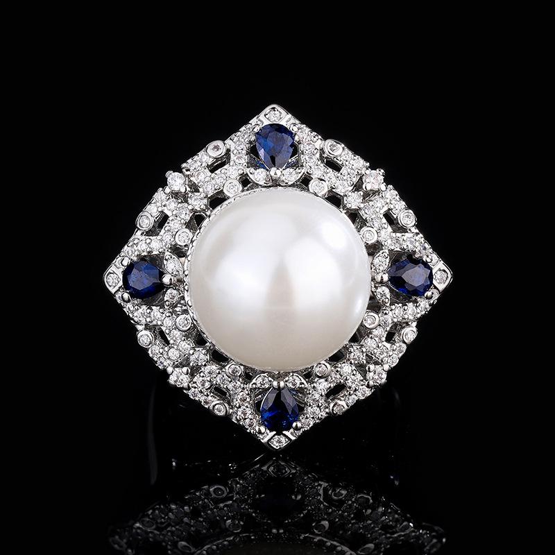 

Ювелирные изделия Медное основание с золотым покрытием Инкрустированные перламутром Фритиллярии Имитация сапфирового цвета с бриллиантовой огранкой Темпераментный набор белых бусин