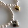 Niche design sense light luxury pearl necklace, fashionable and simple gold and silver love pendant pearl collarbone chain