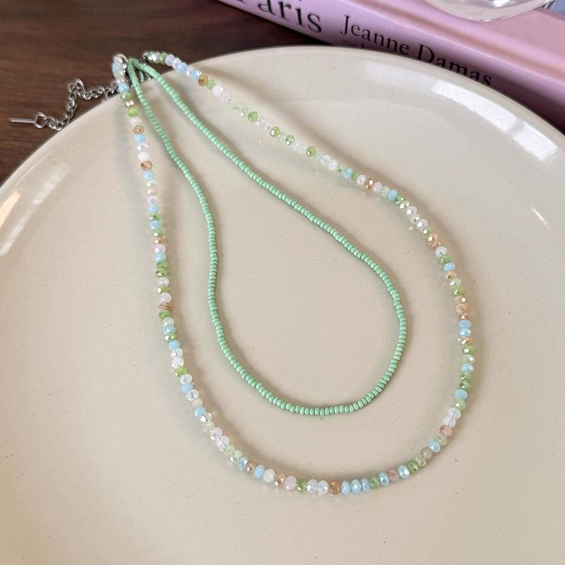 

Різнокольоровий тонкий кришталевий бісерний стек, одягнений у двошарове намисто, простий ланцюжок для ключиць, жінки зелений