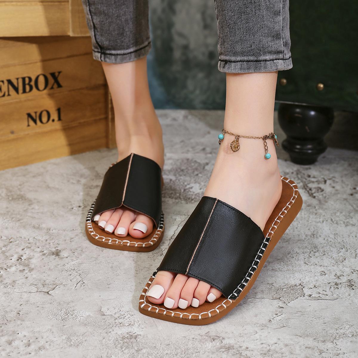 

2025 summer new European and American style one-word cool slippers flat bottom fashion foreign trade large size slippers 43 чёрный