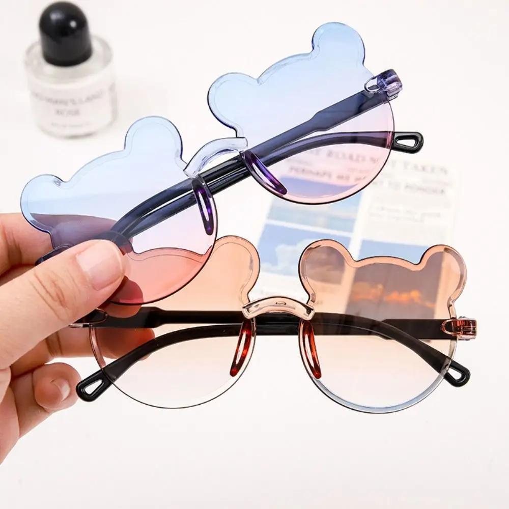 Latest Kids Sunglasses Cartoon Bear Sun Eyeglasses for Boys Girls Children Rimless Design Sun Eyeglasses UV400 Eyeglasses Anti-Glare Sunglasses