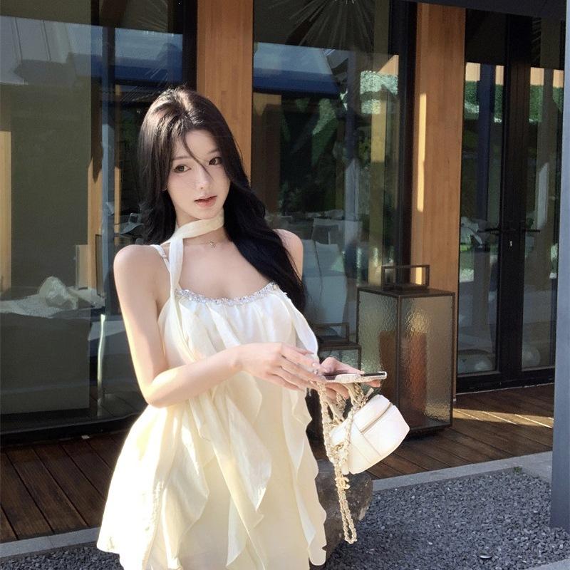 French apricot nail drill suspender dress women's summer ruffle edge loose short skirt design sense pure desire a word skirt