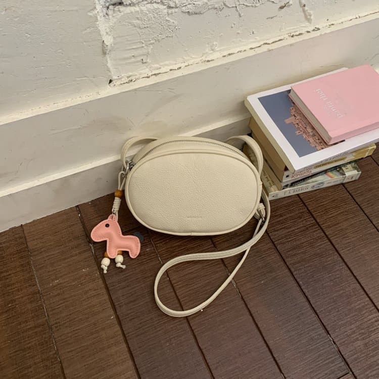 

Soft leather oval crossbody bag women s shoulder bag білий