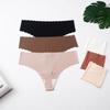 Dámské bezešvé kalhotky tanga s krajkovým lemem a nízkým pasem