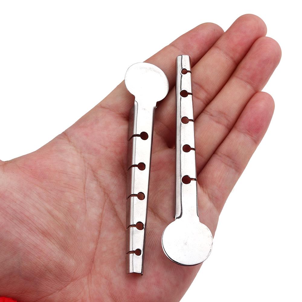 Tragbares Fliegenbindewerkzeug mit mehreren Löchern