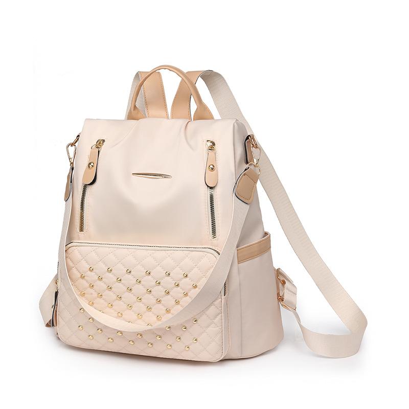 

Студенческая сумка Большая вместимость стильный простой повседневный универсальный рюкзак Рюкзак женский с заклепками