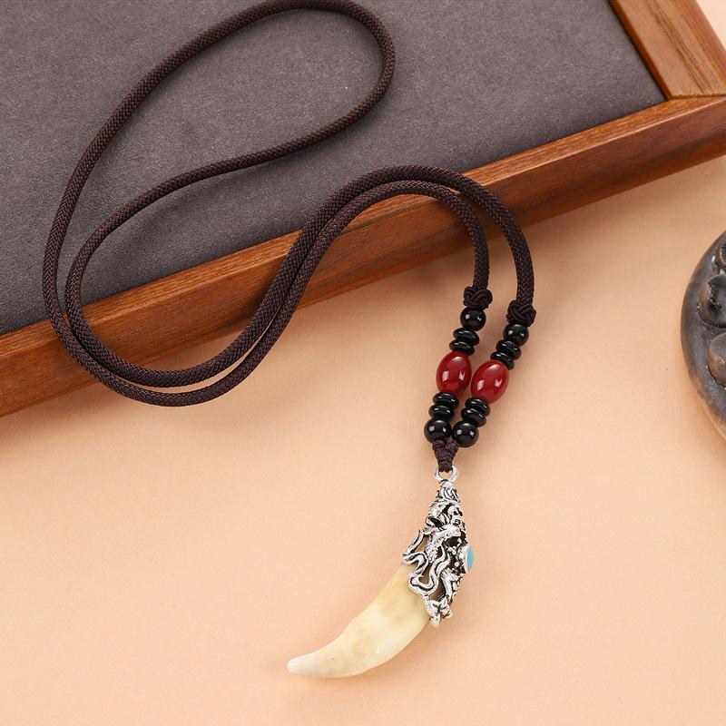 Retro woven dog tooth necklace men's and women's long niche personalized wolf tooth pendant pendant sweater chain accessories