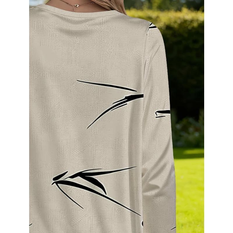 Women's large size with pocket design, simple and fashionable long-sleeved loose T-shirt for women, personalized arrow print design