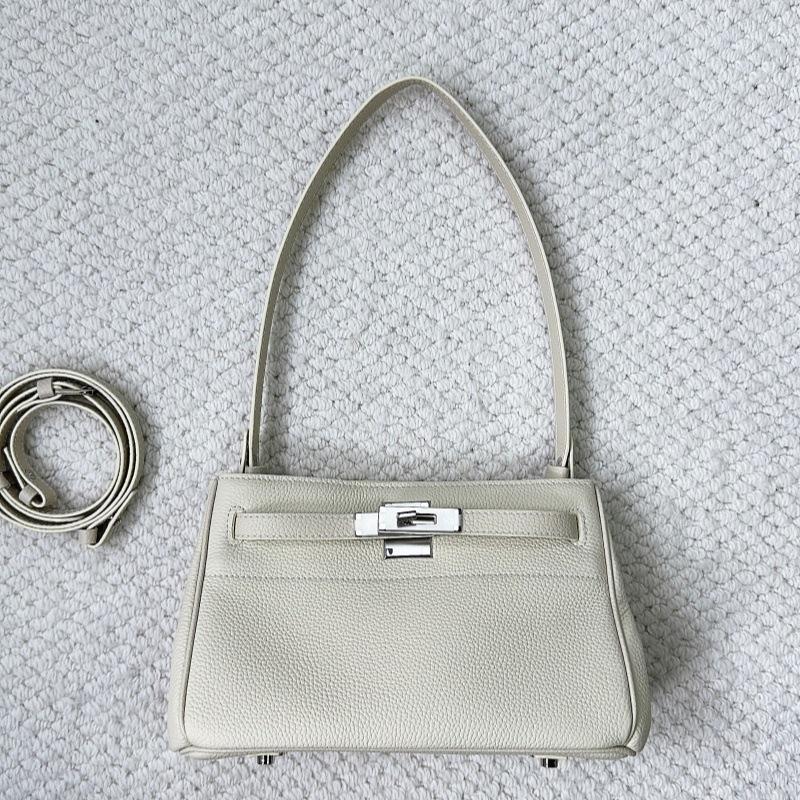 

2025 Новый стиль Минималистичный дизайн Кожа высшего слоя Овчина Пуховик Свободный крой Однобортный Приталенный Пакет 25x10x16cm белый