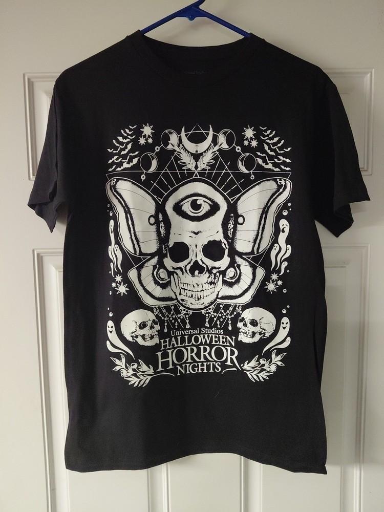 

Tshirt With Skulls Halloween Horror Night Size Medium Universal Studios GLOWS Unisex T-Shirt S