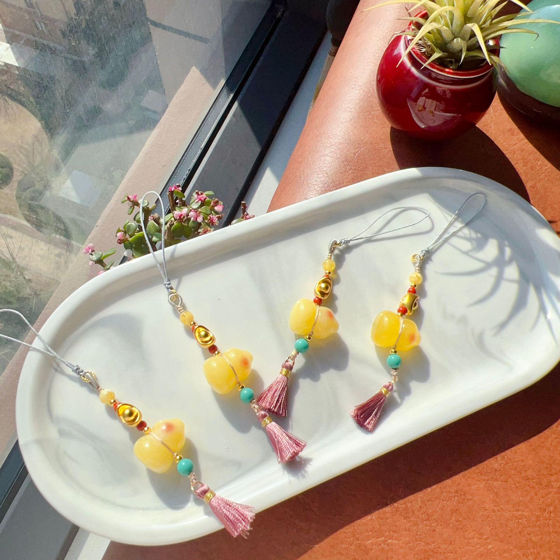 

Second-Gen Colorful Yellow Beeswax Chicken Fat Gourd Pendant for DIY Jewelry, Phone, Car, or Bag Hanging Decor.