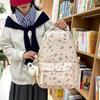 Schulranzen1011 neuer blumiger Mittelschüler Schulranzen hoher Wert Rucksack mit großem Fassungsvermögen Entlastungsrücken Small Fresh Freizeitrucksack