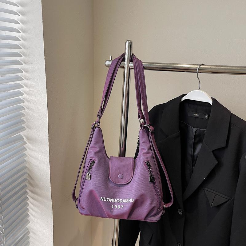 

2025 autumn new shoulder tote bag women s large-capacity commuter backpack niche light travel tote bag