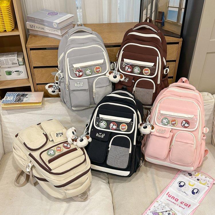 Schoolbag new junior high school student high school student schoolbag large capacity primary school student burden reduction ridge protection high
