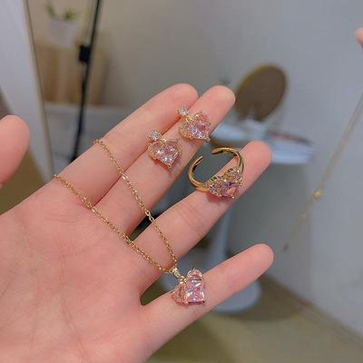 Pink Zircon Romance Jewelry Set: Trendy Love Earrings, Titanium Steel Necklace, and Ring.