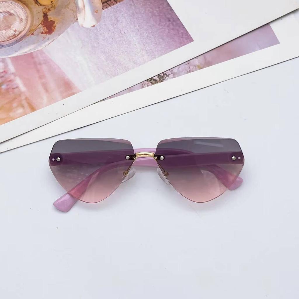 2026 New Children's Fashion Frameless Irregular Personality Trend Dopamine Color Ocean Lens Sunglasses