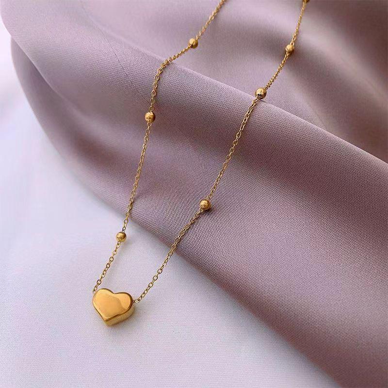 High-End Titanium Steel Colorfast Heart Necklace - Women's Versatile Clavicle Chain with Peach Heart Pendant