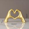 Nordic Style Heart-Shaped Golden Carved Resin Abstract Hand Love Figurine Heart Wedding Home Decor