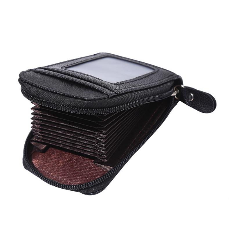 

Модный кожаный клатч с застежкой-молнией и вертикальным органом для карточек чёрный