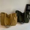 A Casual Corduroy Handbag with Zip Closure, Lightweight and Large Capacity, Fixed Shoulder Strap and Polyester Lining, Solid Everyday Commuter Handbag