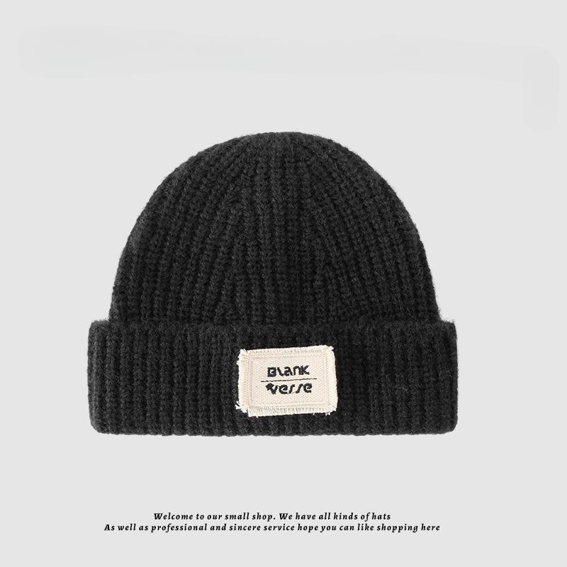 Korean style loose warm letter patch solid color woolen hat for women in autumn and winter pile of cold hats showing face small knitted hat