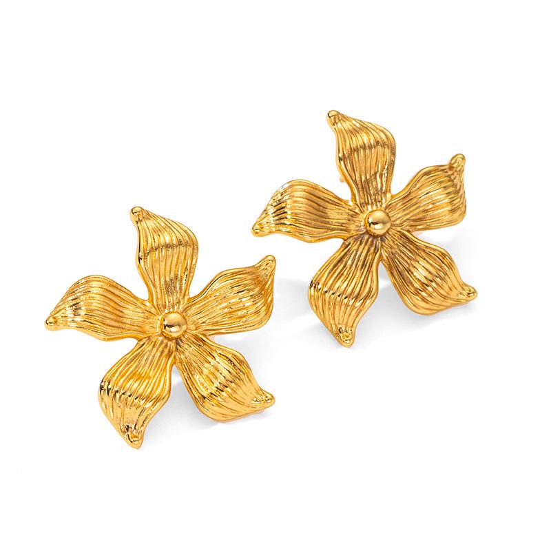 Boucles d'oreilles puce en acier inoxydable à texture métallique rétro européenne et américaine - Mode haut de gamme pour femmes