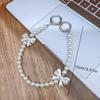 Elegante Handykette mit Perlen, Schmetterlingsknoten-Anhänger, Handgelenkschlaufe für Mobiltelefone, High-End-Stil-Accessoire