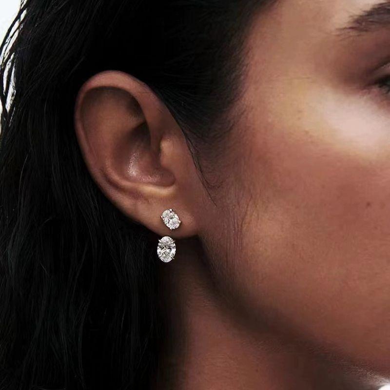 

Back-Mounted Double Oval Rhinestone Earrings Stud Earrings 925 Silver Plated Fashion Ins Style Fancy Non-Fading Design Specifications: 75 Points + 1.5Ct