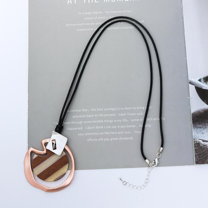 New women's necklace long high fashion retro personality trend pendant European and American